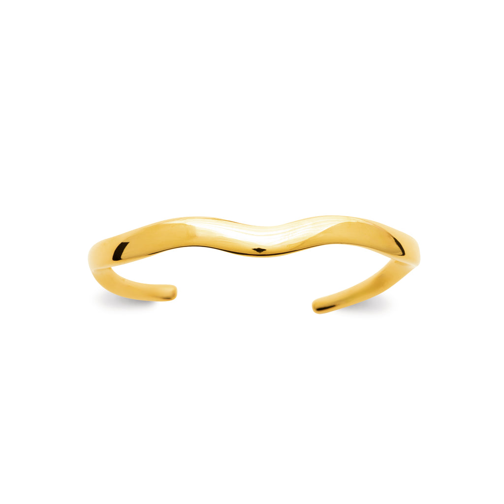 Gold bracelet on a white background