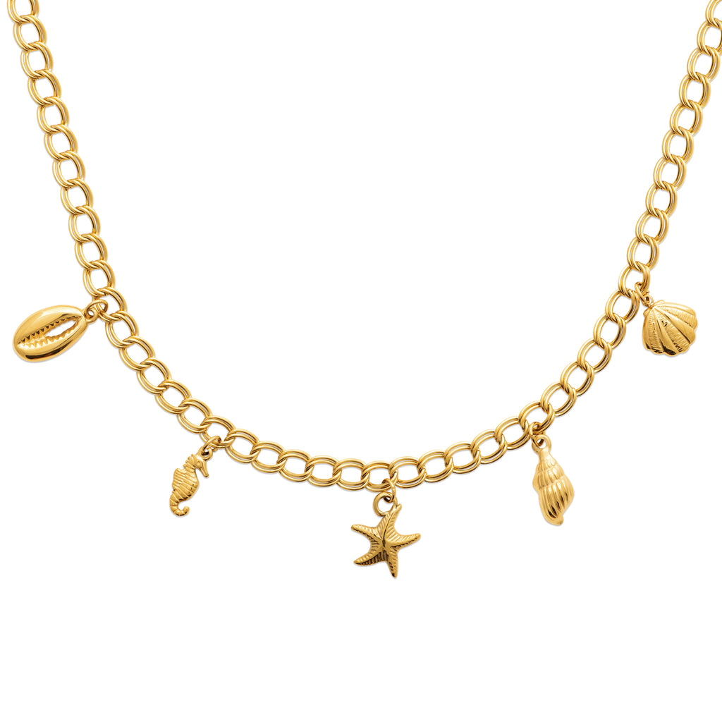 Gold-tone charm chain necklace featuring starfish, shell, seahorse and seashell charms inspired by Nordic coastal life by HNKO