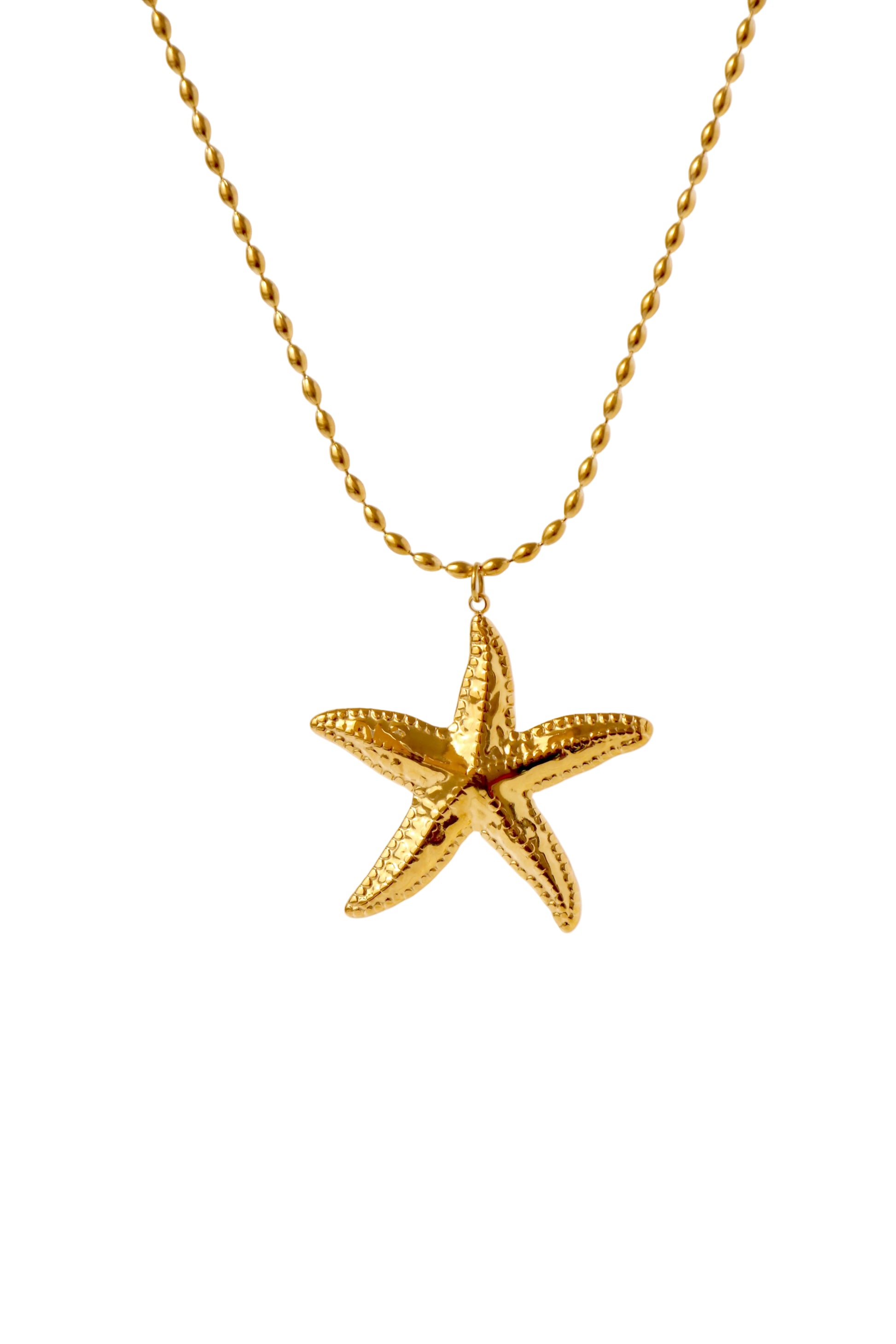 Gold-tone starfish pendant necklace inspired by Nordic coastal life and the shores of Hanko, Finland by HNKO