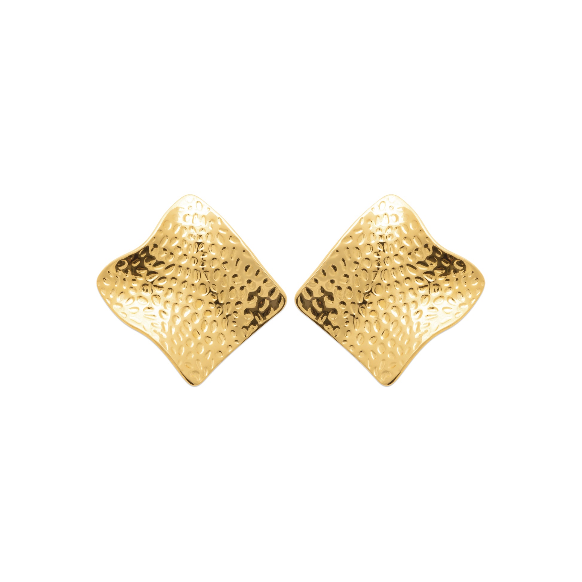 Gold-tone stainless steel statement earrings with a hammered organic texture and sculptural shape inspired by the movement of the sea by HNKO Finland.